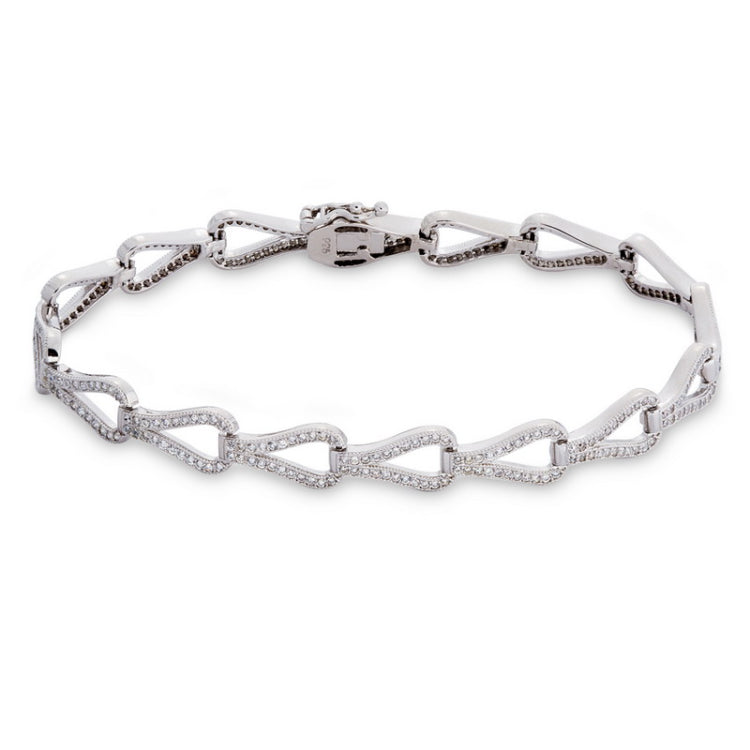 Elevate your wrist game with our platinum finish sterling silver teardrop tennis bracelet. Sparkling simulated diamonds