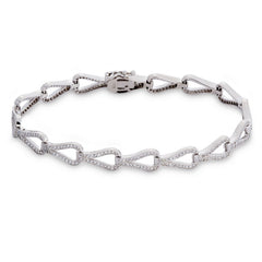 Elevate your wrist game with our platinum finish sterling silver teardrop tennis bracelet. Sparkling simulated diamonds
