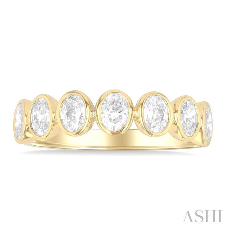 1 1/2 Ctw 7-Stone Bezel Set Oval Cut Diamond Fashion Band in 14K Yellow Gold