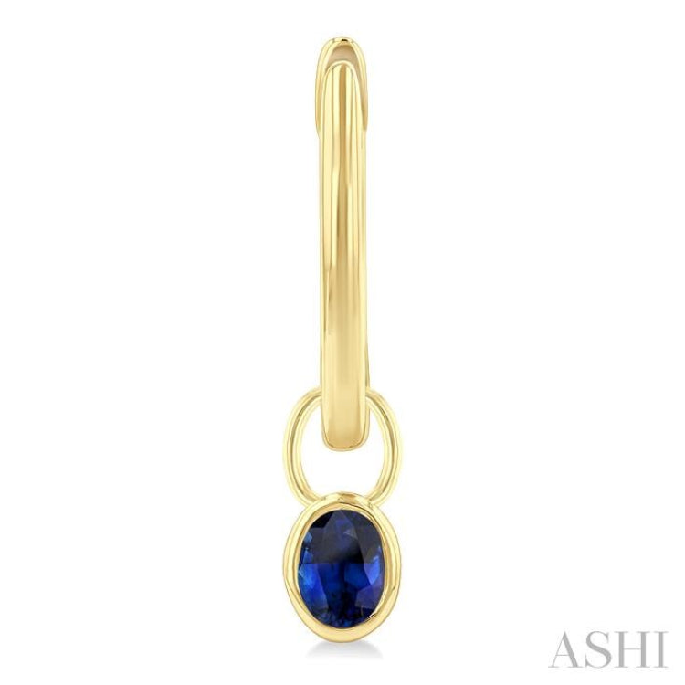 5x3 MM Bezel Set Oval Cut Sapphire Precious Fashion Huggie Earrings in 10K Yellow Gold