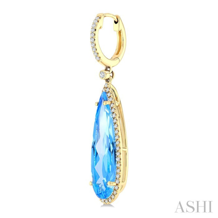 23x7 MM Pear Shape Blue Topaz and 3/8 Ctw Round Cut Diamond Halo Semi-Precious Earrings in 14K Yellow Gold
