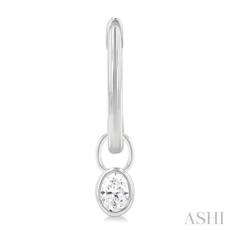 1/3 Ctw Bezel Set Oval Cut Diamond Huggie Earrings in 14K White Gold